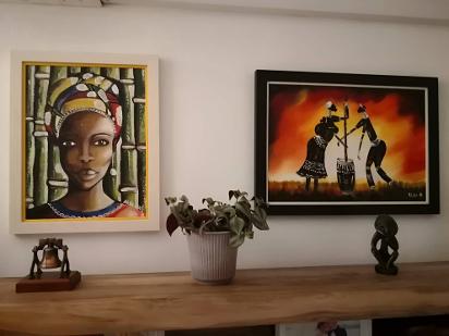 African lady painting Bikis